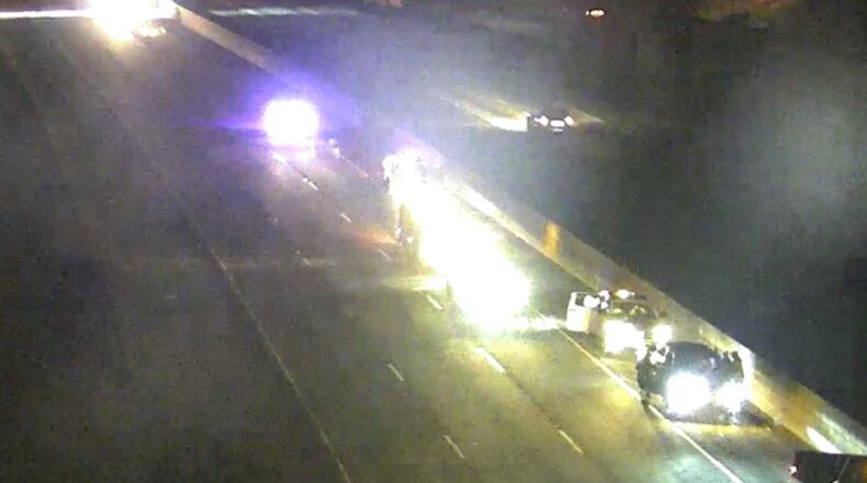 Several lanes of I-285 East were shut down at the I-75 interchange in Clayton County overnight after a police officer was rear-ended in a patrol vehicle while assisting a construction crew.