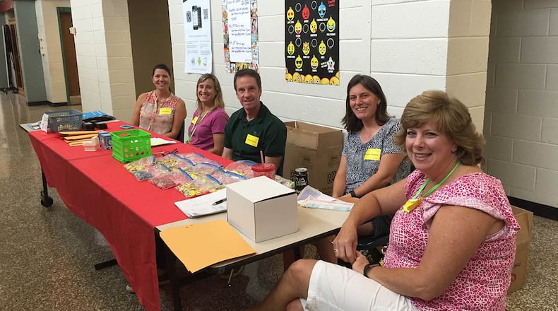 Parents of Pinckneyville Middle School students volunteer at a school fundraiser. The school, as well as others throughout metro Atlanta, has opportunities for working parents to get involved.