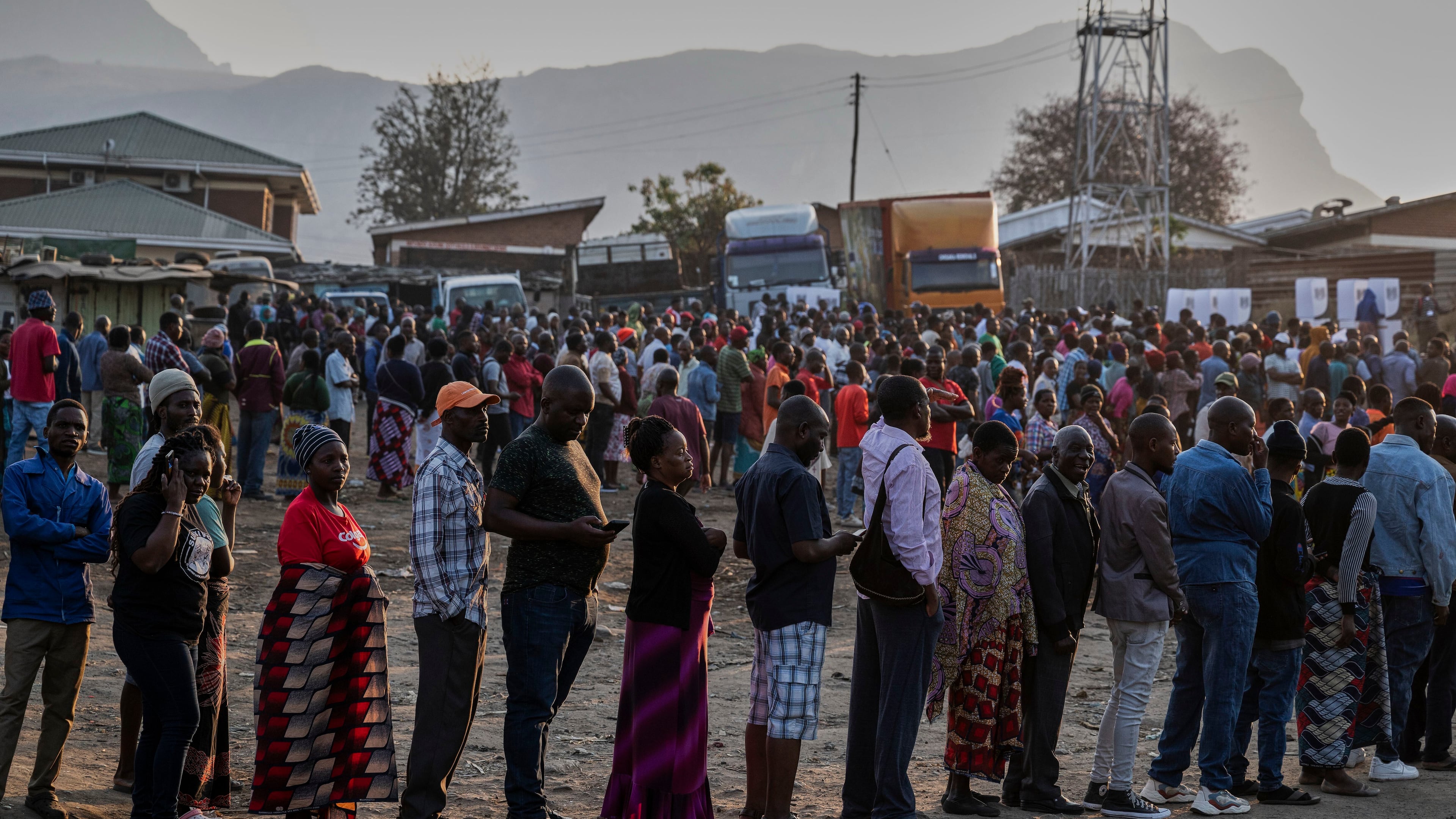 People line up to cast their votes in Blantyre, Malawi, Tuesday, Sept. 16, 2025. (AP Photo/Thoko Chikondi)