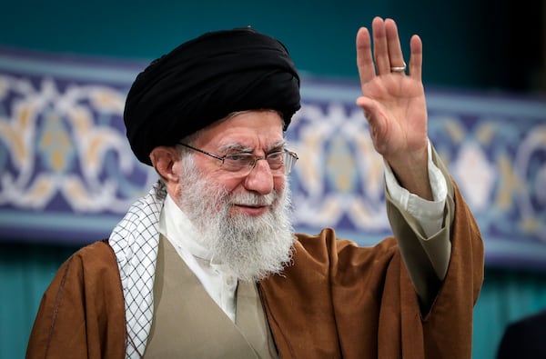 FILE - In this photo released by the office of the Iranian supreme leader, Supreme Leader Ayatollah Ali Khamenei waves to the crowd during a meeting with officials, Islamic countries' ambassador to Iran and a group of people in Tehran, Iran, March 31, 2025. (Office of the Iranian Supreme Leader via AP, File)