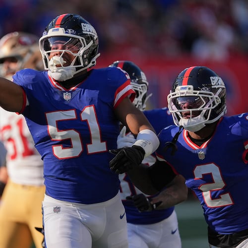 New York Giants linebacker Abdul Carter (51) reacts after recovering a fumble by the San Francisco 49ers during the second quarter of an NFL football game, Sunday, Nov. 2, 2025, in East Rutherford, N.J. (AP Photo/Seth Wenig)