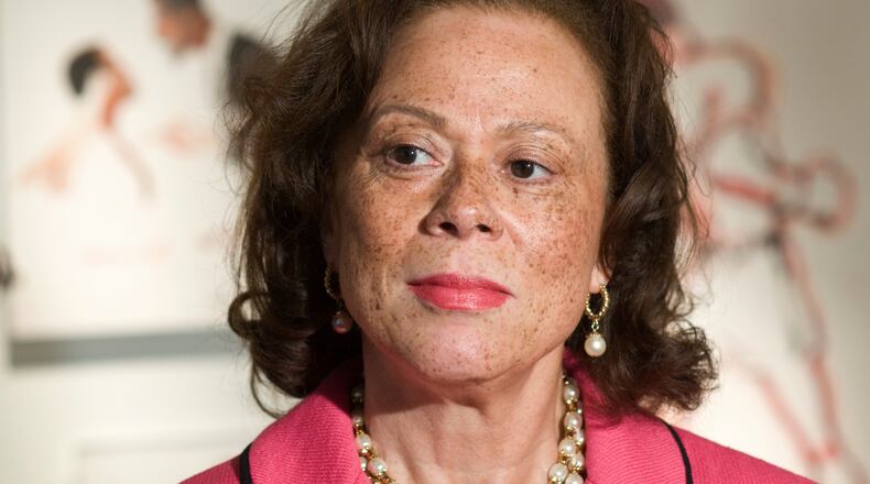 FILE - Lonnie Ali, wife of boxing legend Muhammad Ali, appears at the Muhammad Ali Center in Louisville, Ky., on Jan. 13, 2012. (AP Photo/Brian Bohannon, File)