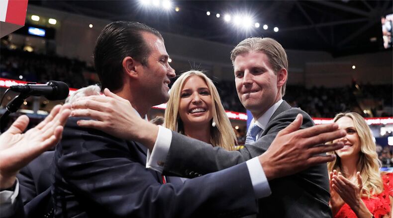 Republican Presidential Candidate Donald Trump's children Donald Trump, Jr., Ivanka Trump, and Eric Trump celebrate on the convention floor during the second day session of the Republican National Convention in Cleveland on Tuesday. (AP/Carolyn Kaster)