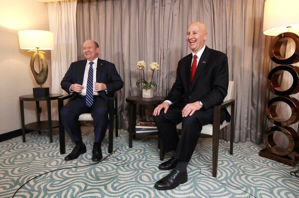 U.S. Senator Pete Ricketts, right, and Chris Coons are interviewed by the Associated Press in Taipei, Taiwan, Thursday, April 17, 2025. (AP Photo/Chiang Ying-ying)