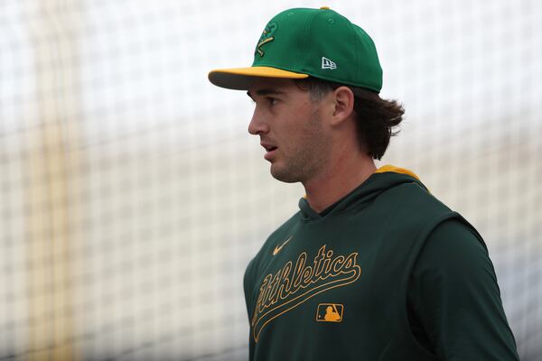 Athletics shortstop Jacob Wilson finishes his round of batting practice before a baseball game against the Chicago Cubs, Tuesday, April 1, 2025, in West Sacramento, Calif. (AP Photo/Scott Marshall)