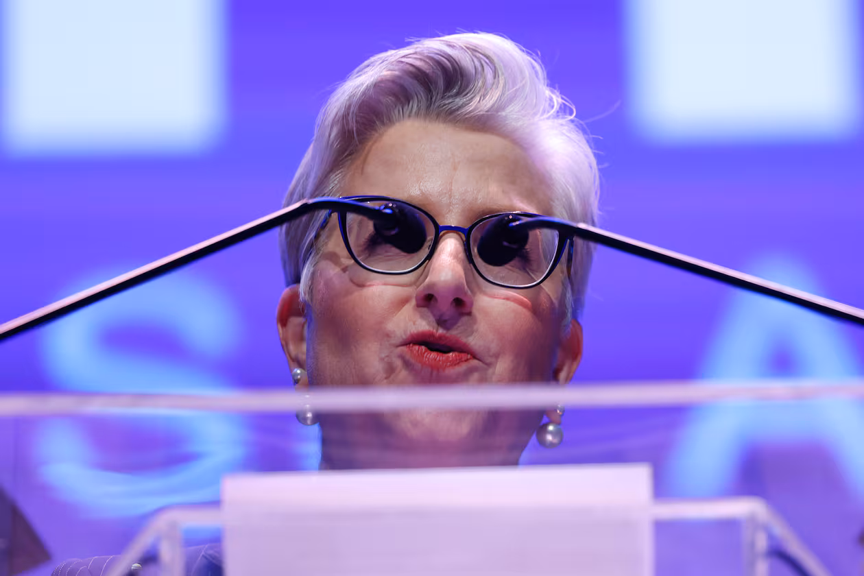 The lectern's microphones line up perfectly with UPS CEO Carol Tomé's glasses as she speaks ahead of the Atlanta mayor's State of the City address March 18. (Arvin Temkar/AJC)