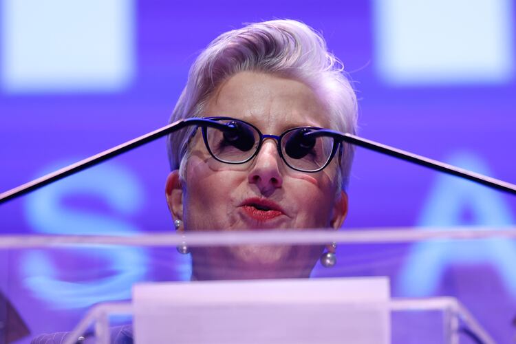 The lectern's microphones line up perfectly with UPS CEO Carol Tomé's glasses as she speaks ahead of the Atlanta mayor's State of the City address March 18. (Arvin Temkar/AJC)