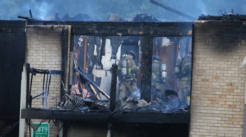 Fire destroyed several units at the Spring Valley Apartments on Misty Valley Drive in DeKalb County on Thursday night. (Ben Gray / bgray@ajc.com)