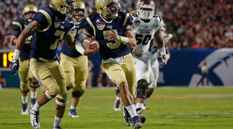 MIAMI GARDENS, FL - DECEMBER 31: Justin Thomas #5 of the Georgia Tech Yellow Jackets rushes during the Capital One Orange Bowl game against the Mississippi State Bulldogs at Sun Life Stadium on December 31, 2014 in Miami Gardens, Florida. (Photo by Chris Trotman/Getty Images) The return of Georgia Tech quarterback Justin Thomas was not enough to sway ESPN's Stats and Information department to rank the Yellow Jackets higher than No. 23 in a preseason rating. (ASSOCIATED PRESS)