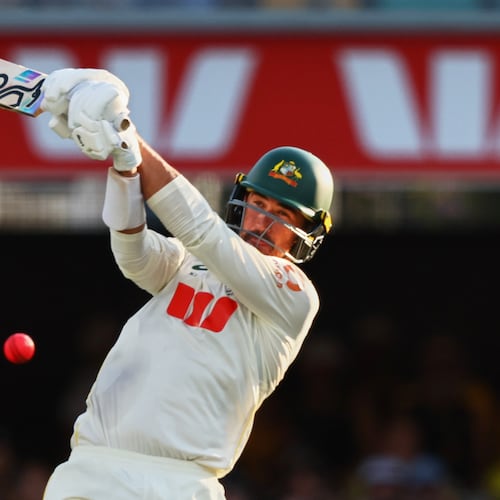 Australia's Mitchell Starc plays a shot during the second Ashes cricket test match between Australia and England in Brisbane, Saturday, Dec. 6, 2025.. (AP Photo/Tertius Pickard)