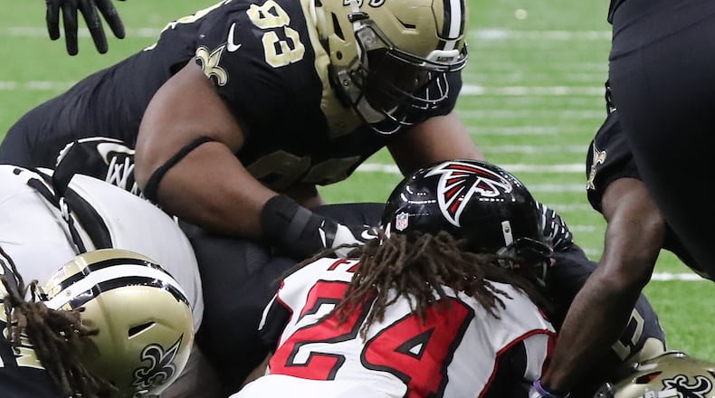 Falcons running back Devonta Freeman fumbles just short of the endzone and the Saints recover during the third quarter in a NFL football game on Sunday, December 24, 2017, in New Orleans.