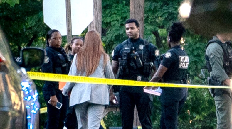 Three Atlanta police officers were shot Saturday afternoon in the Capital View neighborhood on the 1400 block of Desoto Avenue SW. (Ben Hendren for The Atlanta Journal Constitution)