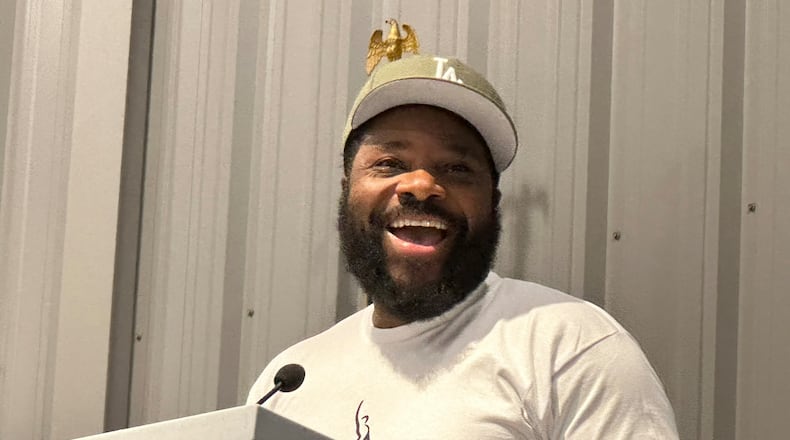 Actor Malcolm-Jamal Warner, pictured in Atlanta in 2023, failed to honor his prenuptial agreement, his widow, Tenisha Warner, claims in a lawsuit filed in DeKalb County against the actor's mother on Monday, the one-year anniversary of his death. (Rodney Ho/AJC)
