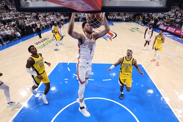 Oklahoma City Thunder forward Chet Holmgren (7) dunks during the second half in Game 1 of the NBA Finals basketball series against the Indiana Pacers Thursday, June 5, 2025, in Oklahoma City. (Matthew Stockman/Pool Photo via AP)
