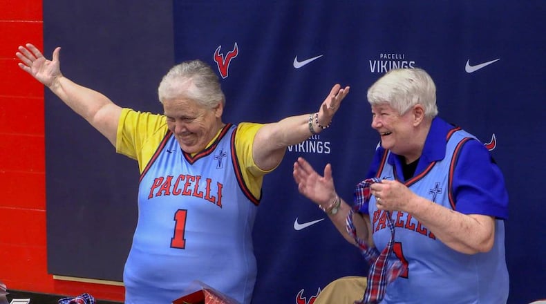 Sister Margaret Downing (left) and Sister Pat Thompson, both of the Sisters of Mercy, were recognized at St. Anne-Pacelli Catholic School on Dec. 9, 2024, with a ceremony honoring them. Both are retiring, and the school unveiled a special basketball jersey in their honor. (Photo Courtesy of Mike Haskey)