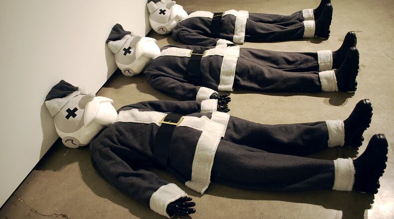 Artist Craig Drennen’s solo show “Bandit” features this sculpture in cast plastic, acrylic and custom suits, “Bandits.”