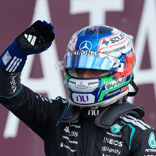 Mercedes driver Andrea Kimi Antonelli of Italy celebrates after clocked the fastest time during the qualifying session ahead of the British F1 Grand Prix, in Silverstone, England, Saturday, July 4, 2026. (AP Photo/Darko Bandic)