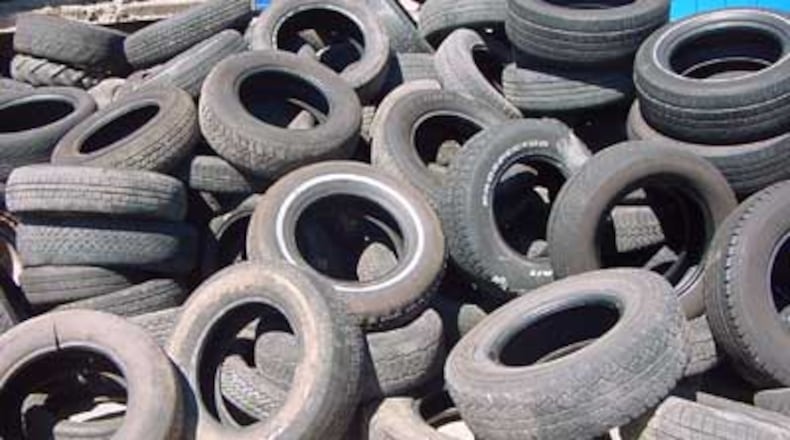 A file photo shows a pile of scrap tires. A recent order from the Georgia Public Service Commission allows scrap tires and even natural gas to be added to the mix that biomass energy producers could burn to produce electricity.