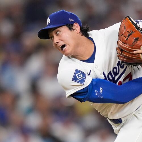 Los Angeles Dodgers starting pitcher Shohei Ohtani throws to the plate during the sixth inning of a baseball game against the San Diego Padres, Friday, July 3, 2026, in Los Angeles. (AP Photo/Mark J. Terrill)