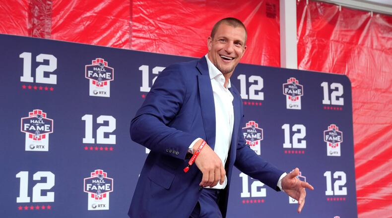 FILE - Former New England Patriots tight end Rob Gronkowski arrives for the Patriots Hall of Fame induction ceremony for former Patriots quarterback Tom Brady, at Gillette Stadium on June 12, 2024, in Foxborough, Mass. (AP Photo/Steven Senne, File)