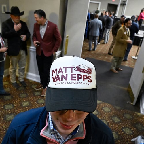 Carson Baddeley and other supporters gather for an election night watch party for Republican candidate Matt Van Epps who is running in a special election for U.S. seventh congressional district seat, Tuesday, Dec. 2, 2025, in Nashville, Tenn. (AP Photo/John Amis)