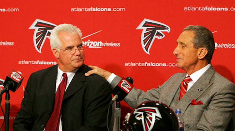 Arthur Black (right), when hiring head coach Mike Smith. File photo