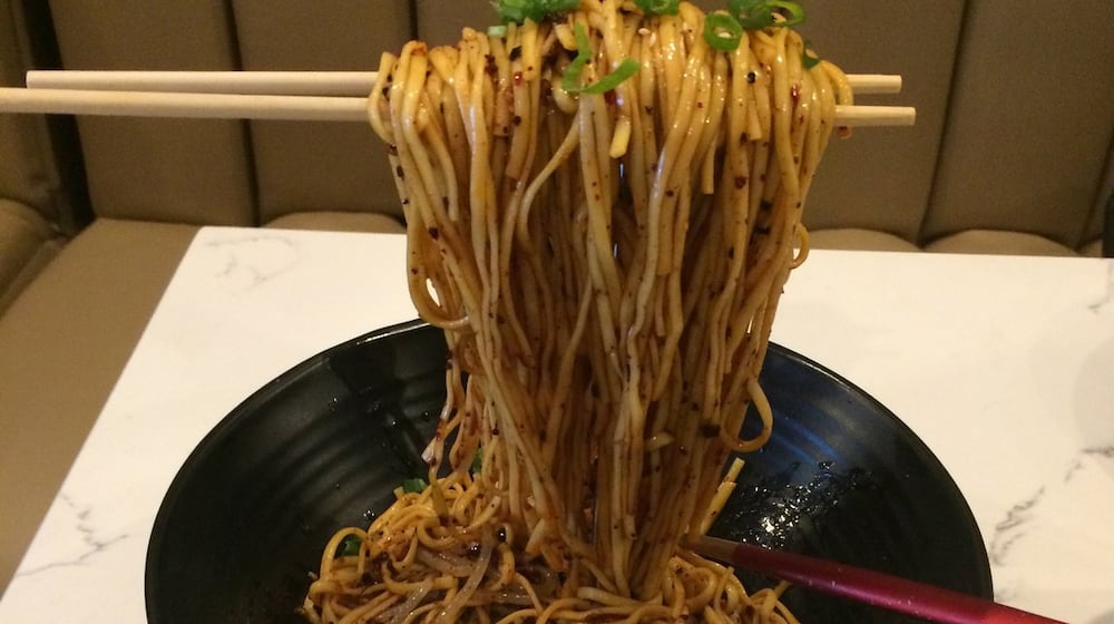 The Chengdu cold noodles are probably the most Instagram-worthy dish at Gu’s Kitchen, thanks to the floating chopsticks presentation. CONTRIBUTED BY WENDELL BROCK