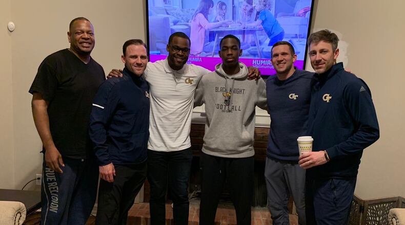 Central Gwinnett linebacker Cornelius Evans (gray sweatshirt) at a home visit from Georgia Tech coaches early Friday, January 11, 2019. From left: Evans' father Demond Pearson, cornerbacks coach Jeff Popovich, outside linebackers/defensive end coach Larry Knight, Evans, defensive coordinator Andrew Thacker, co-defensive coordinator/safeties coach Andrew Burton. (Courtesy Cornelius Evans)