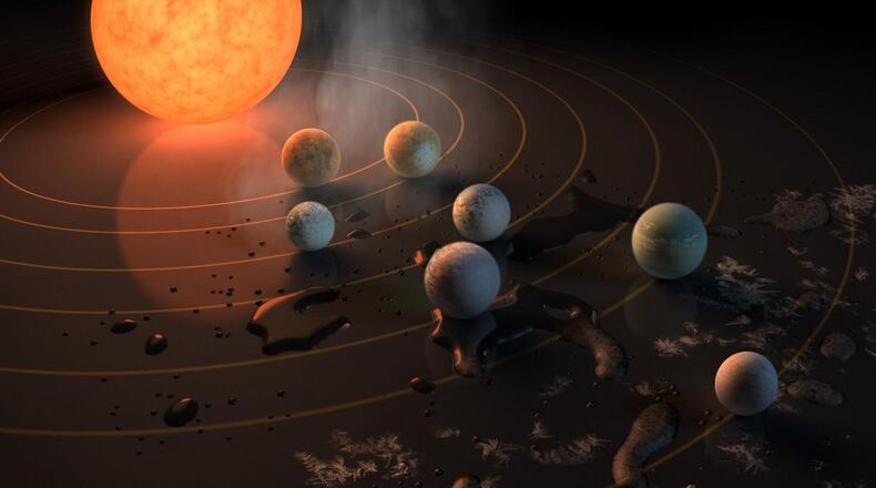 At least one of the seven rocky planets orbiting Trappist-1 better have a beach and a margarita machine, non-experts said. (Image from NASA)