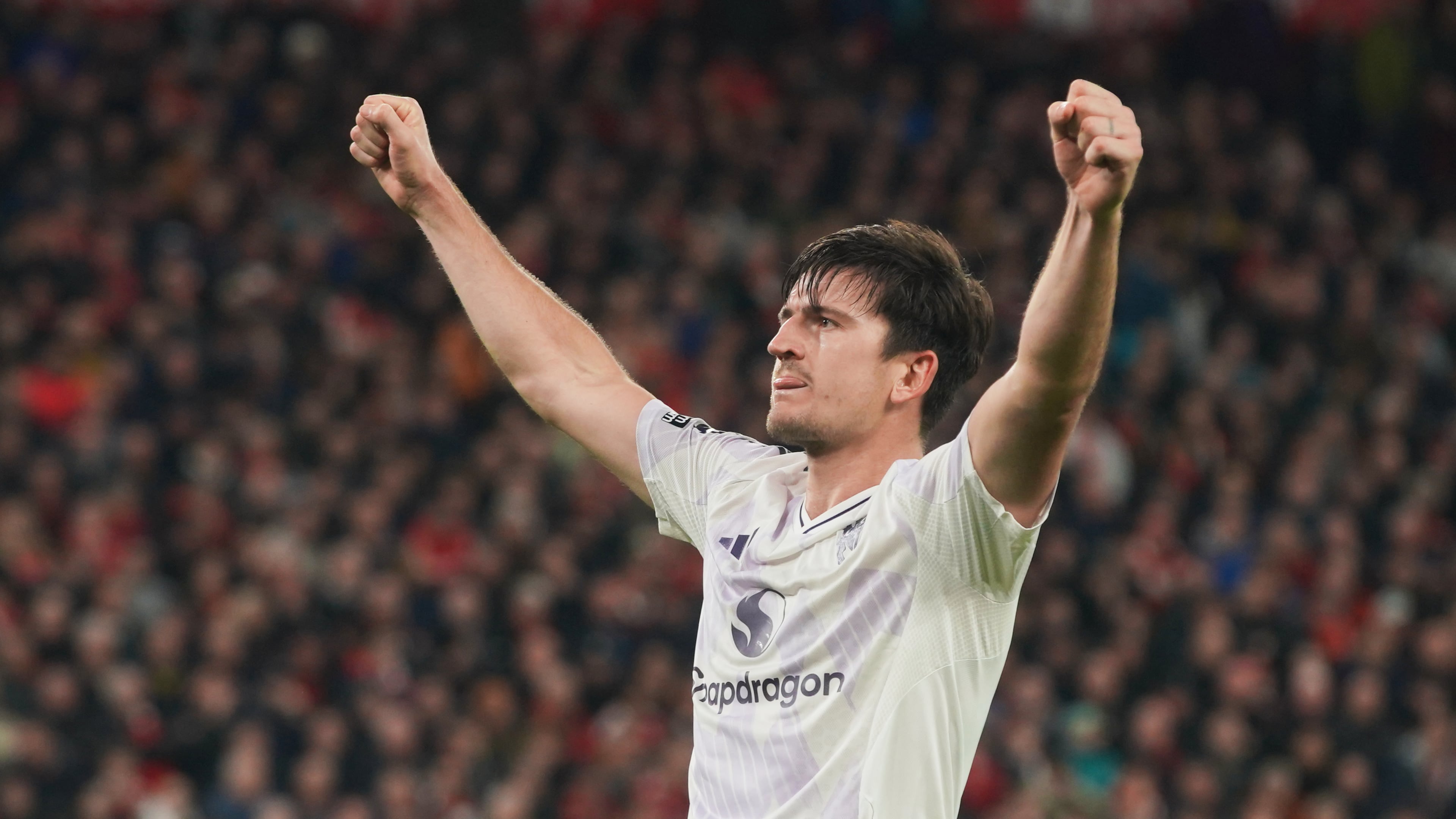 Manchester United's Harry Maguire celebrates after scoring his side's second goal during the English Premier League soccer match between Liverpool and Manchester United in Liverpool, England, Sunday, Oct. 19, 2025. (AP Photo/Ian Hodgson)