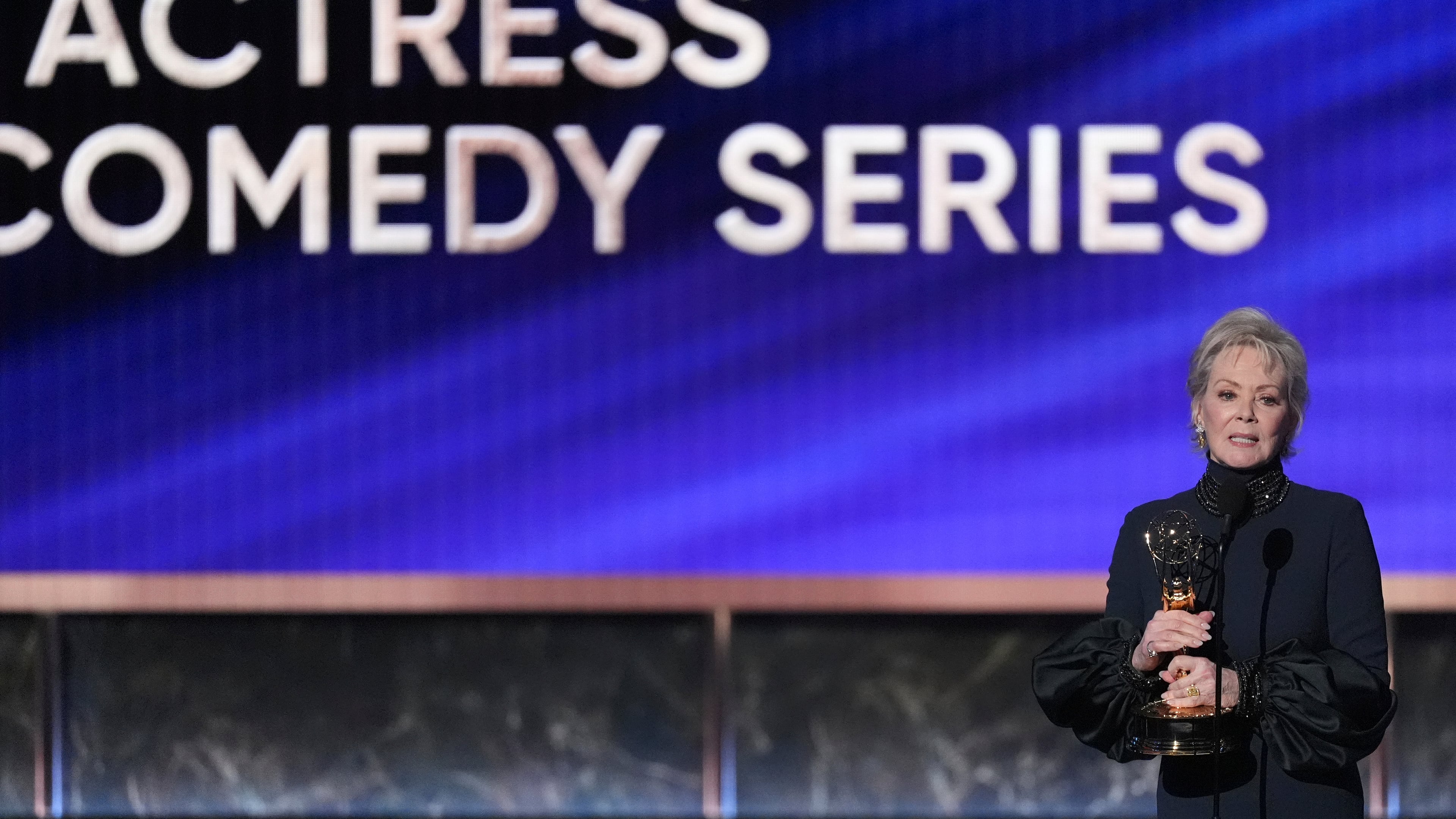 Jean Smart accepts the award for outstanding lead actress in a comedy series for "Hacks" during the 77th Primetime Emmy Awards on Sunday, Sept. 14, 2025, at the Peacock Theater in Los Angeles. (AP Photo/Chris Pizzello)