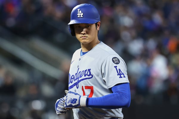 Los Angeles Dodgers' Shohei Ohtani stands on the field during the third inning of a baseball game against the New York Mets Friday, May 23, 2025, in New York. (AP Photo/Pamela Smith)