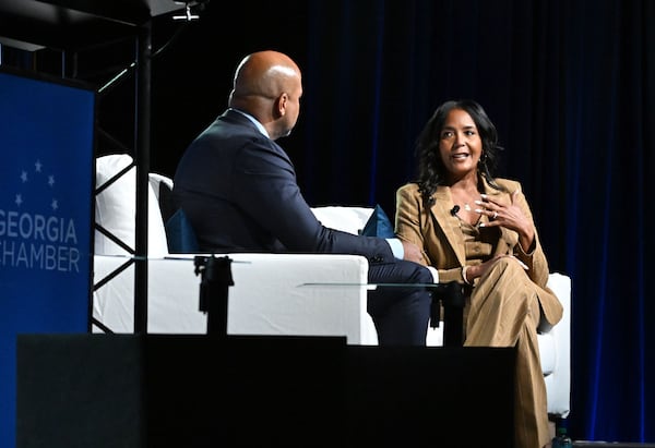 Gubernatorial candidate Keisha Lance Bottoms (right) speaks with moderator Tharon Johnson during the Georgia Chamber congressional luncheon Wednesday, Aug. 5, 2026, at the Classic Center in Athens. (Hyosub Shin/AJC)
