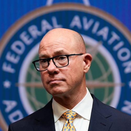 FILE - Federal Aviation Administration administrator Bryan Bedford looks on as Transportation Secretary Sean Duffy speaks during a news conference on new drone regulations, Aug. 5, 2025, at the Department of Transportation in Washington. (AP Photo/Julia Demaree Nikhinson, File)