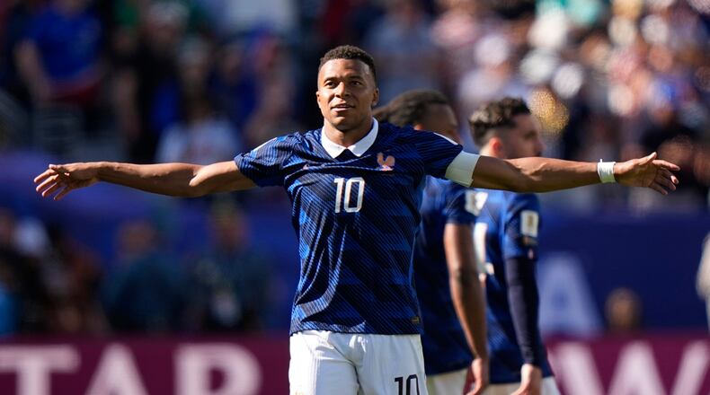 France's Kylian Mbappe celebrates after scoring his side's third goal during the World Cup Group I soccer match between France and Senegal in East Rutherford, N.J., near New York, Tuesday, June 16, 2026. (AP Photo/Frank Franklin II)