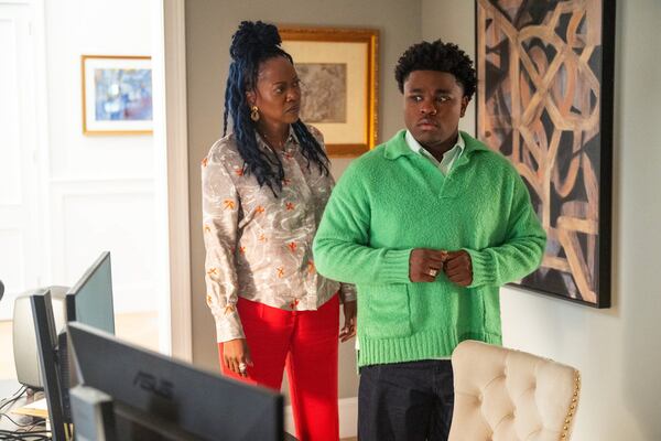 In NBC's new "The Fall and Rise of Reggie Dinkins," Erika Alexander plays Monica and Jalyn Hall is her son, Carmelo. (Scott Gries/NBC)