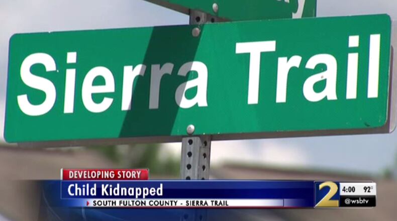 A child was kidnapped in South Fulton on Monday morning when a suspect tried to steal a car.