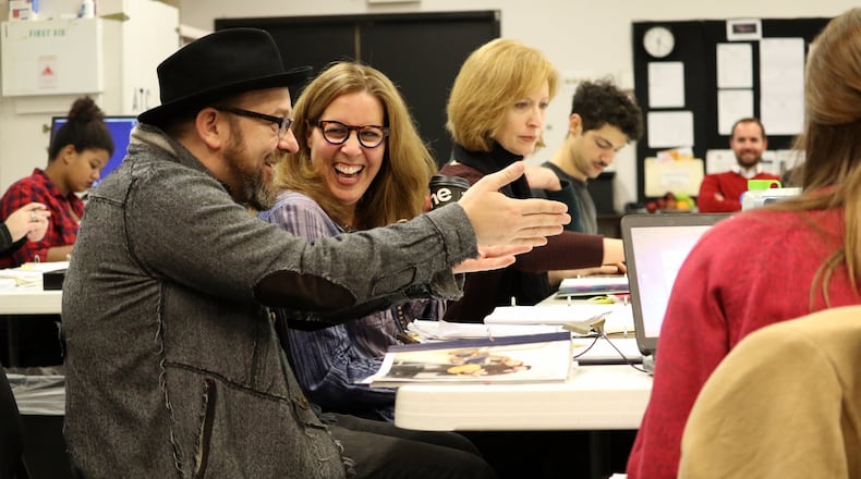 Kristian Bush and Janece Shaffer share a laugh at rehearsal for “Troubadour” while director Susan V. Booth looks on.