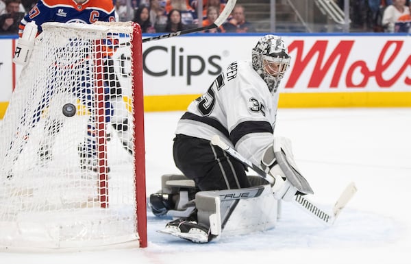 Los Angeles Kings goalie Darcy Kuemper (35) makes a save against the Edmonton Oilers during the second period of an NHL hockey game in Edmonton, Alberta, Thursday, May 1, 2025. (Jason Franson/The Canadian Press via AP)