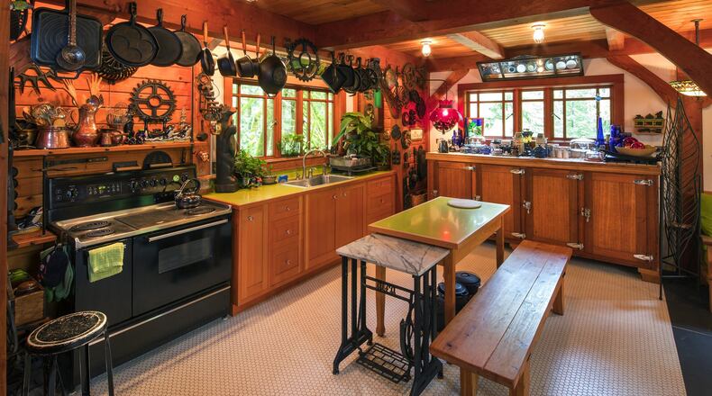Daucey and Pat Brewington’s home outside North Bend features a mahogany fixture (far end of the kitchen under the window) in the kitchen, which is an old beer cooler from a defunct Queen Anne Hotel. (Mike Siegel/Seattle Times/TNS)