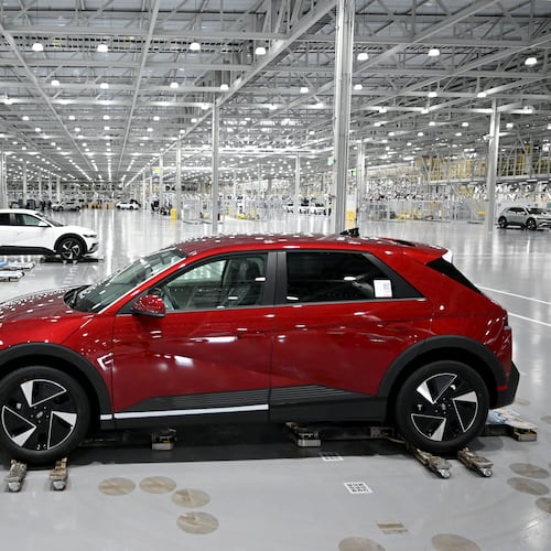 Hyundai IONIQ 5 electric vehicles are transported by autonomous mobile robots at the final stage of the assembly line at Hyundai Motor Group Metaplant America (HMGMA) on Wednesday, May 6, 2026, in Ellabell, Georgia. Hyundai Metaplant behind-scenes-tour as the plant prepares to start a second shift and a second production line. Plant tour and interview with top plant officials. (Hyosub Shin/AJC)