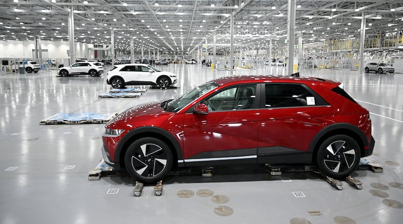 Hyundai IONIQ 5 electric vehicles are transported by autonomous mobile robots at the final stage of the assembly line at Hyundai Motor Group Metaplant America (HMGMA) on Wednesday, May 6, 2026, in Ellabell, Georgia. Hyundai Metaplant behind-scenes-tour as the plant prepares to start a second shift and a second production line. Plant tour and interview with top plant officials. (Hyosub Shin/AJC)
