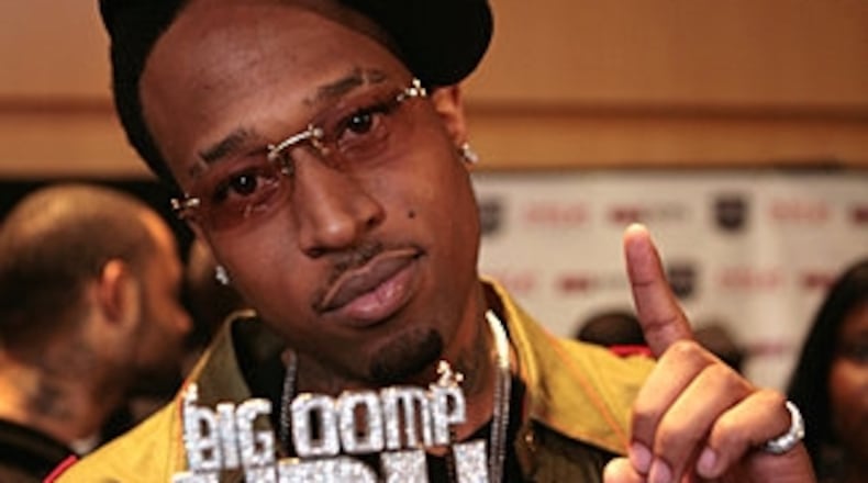 DJ Unk holds up his bling for a photo on the black carpet before Atlanta's Dirty Awards in 2008. The artist, born Anthony Platt, died on Friday, Jan. 24, 2025. He was 43. Photo credit: Jessica McGown