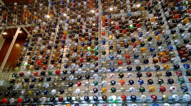 The College Football Hall of Fame in downtown Atlanta displays the helmet of every college football team.