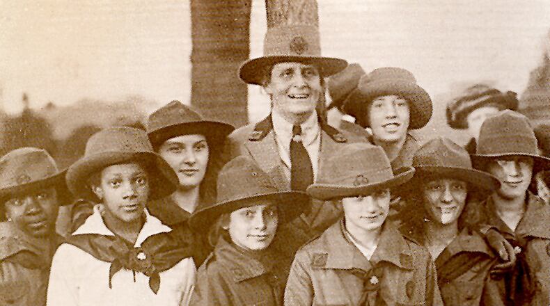 Savannah native Juliette Gordon Low, who returned to her hometown to found the Girl Scouts, is seen here with some Girl Scouts in 1920. Photo courtesy of Girl Scouts of America