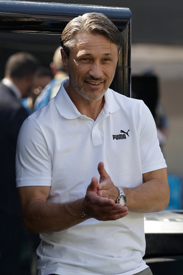 Borussia Dortmund's coach Niko Kovac waits for the beginning of the Club World Cup quarterfinal soccer match between Real Madrid and Borussia Dortmund in East Rutherford, N.J., Saturday, July 5, 2025. (AP Photo/Adam Hunger)