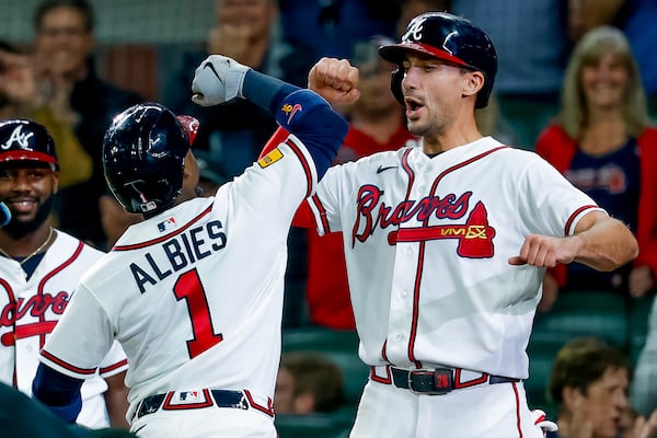 The Braves’ Ozzie Albies (left) and Matt Olson celebrate a recent home run. (Erik S. Lesser/AP)
