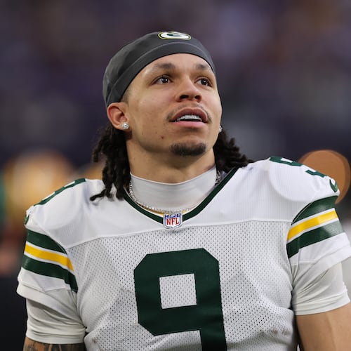 FILE - Green Bay Packers wide receiver Christian Watson looks on during the first half of an NFL football game against the Minnesota Vikings, Jan. 4, 2026 in Minneapolis. (AP Photo/Stacy Bengs, File)