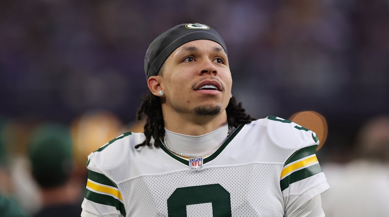 FILE - Green Bay Packers wide receiver Christian Watson looks on during the first half of an NFL football game against the Minnesota Vikings, Jan. 4, 2026 in Minneapolis. (AP Photo/Stacy Bengs, File)