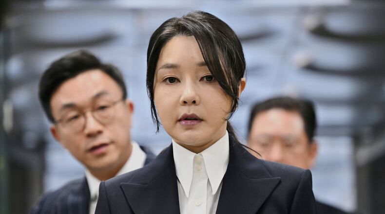FILE - South Korea's former first lady Kim Keon Hee, wife of former president Yoon Suk Yeol, arrives at a court to attend a hearing to review her arrest warrant requested by special prosecutors, in Seoul, South Korea, on Aug. 12, 2025. (Jung Yeon-je/Pool Photo via AP, File)